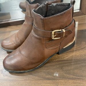 Brown booties with gold accents
